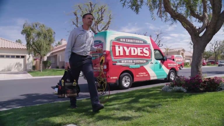 Real Not Stock Image Of Hvac Teach Walking To Customer Door